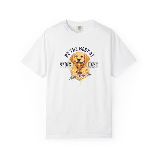 White t-shirt with a dog graphic and text on a white background Be The Best At Being Last — Golden Retriever Tee
