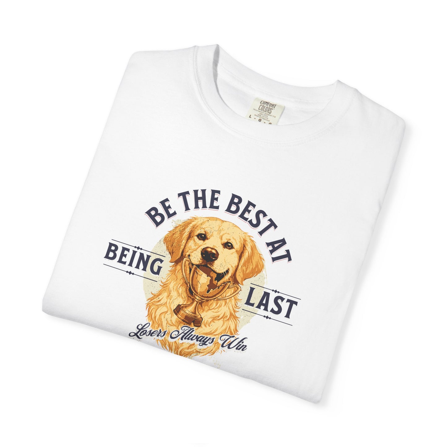 White t-shirt with a dog illustration and text on a white background Be The Best At Being Last — Golden Retriever Tee