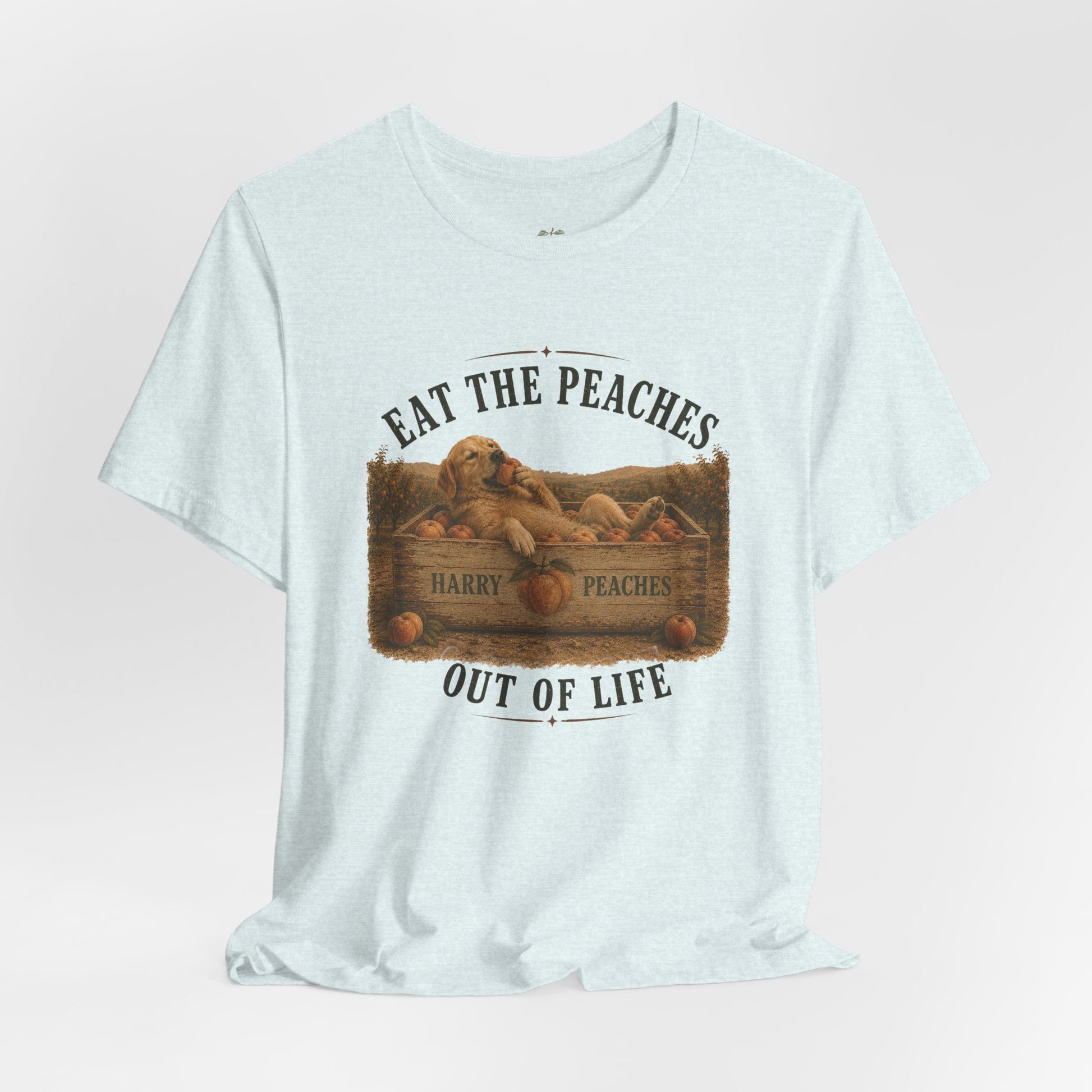 White t-shirt with graphic design and text on a light pink background