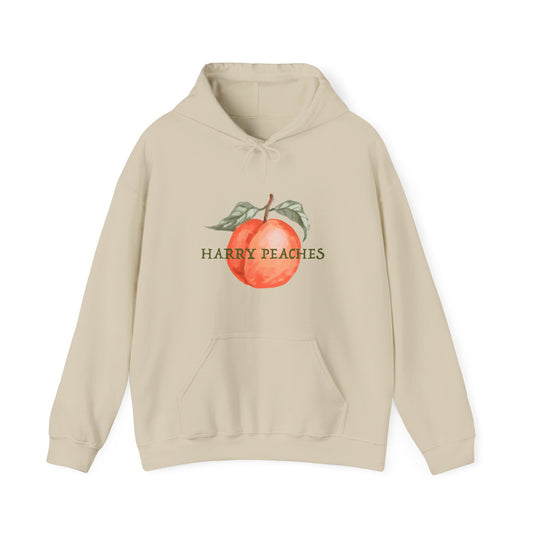 Beige hoodie with a peach graphic and 'Harry Peaches' text on a white background
