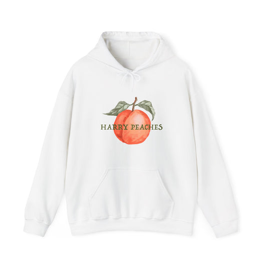 White hoodie with a peach graphic and 'Harry Peaches' text on a white background