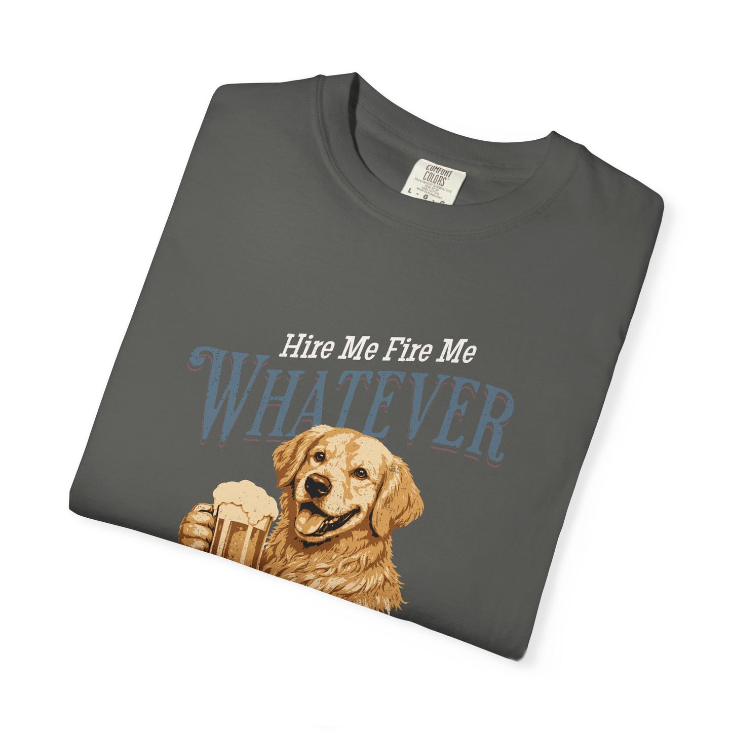 Folded gray t-shirt with a dog graphic and text on a white background Hire Me, Fire Me, Whatever — Golden Retriever Tee