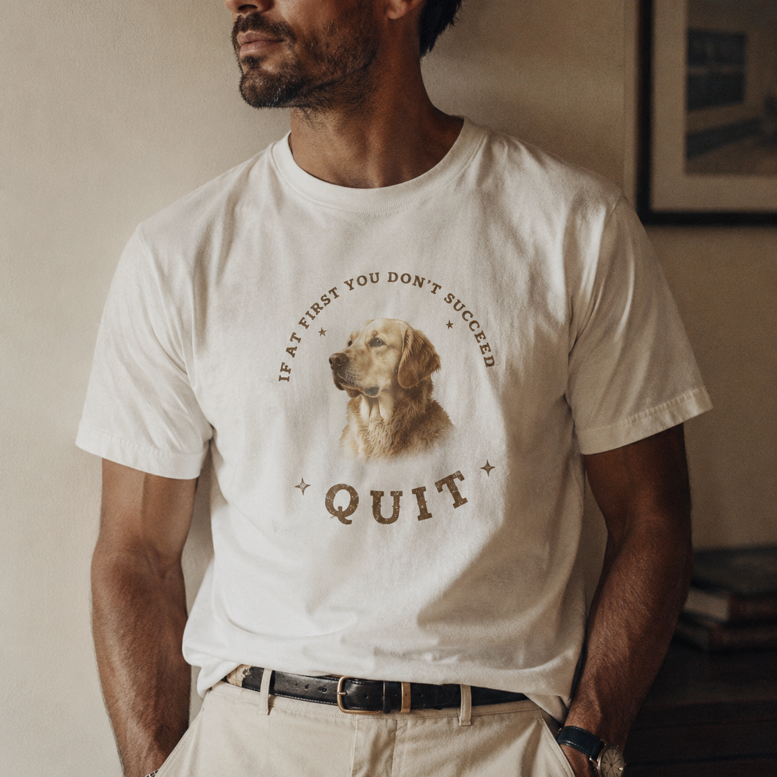 A man wearing a white graphic t-shirt with a golden retriever illustration and the text 'IF YOU DON'T SUCCESS YOU WILL FAIL' and 'QUIT'.