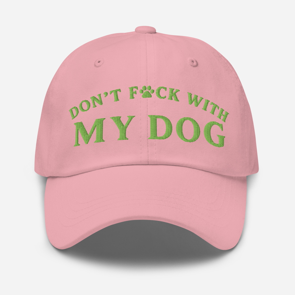Pink cap with green text 'DON'T F*CK WITH MY DOG' on a light gray background
