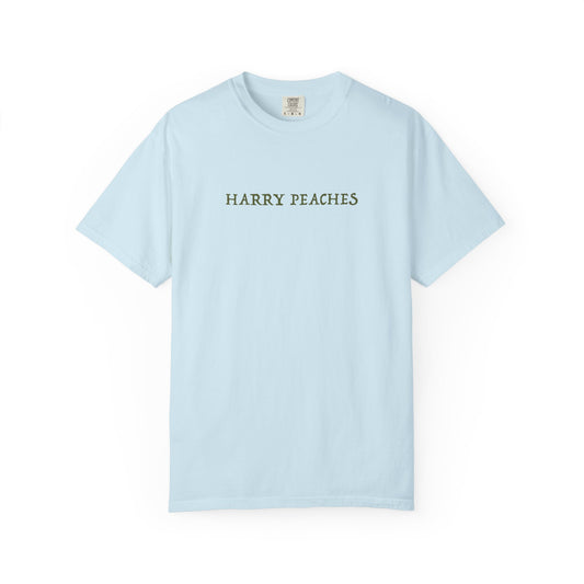 Light blue t-shirt with 'HARRY PEACHES' text on a white background