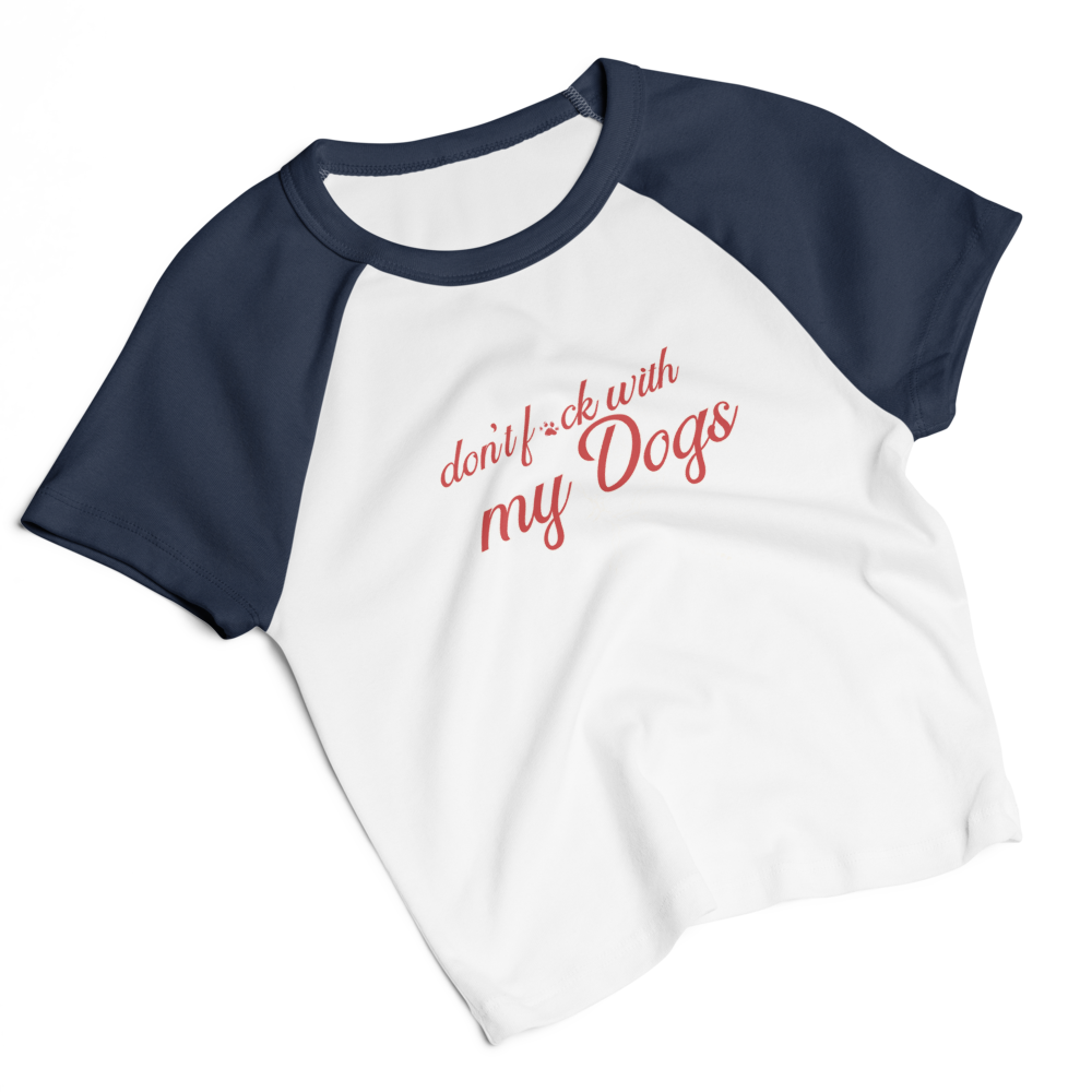 White t-shirt with navy sleeves and red text on a white background